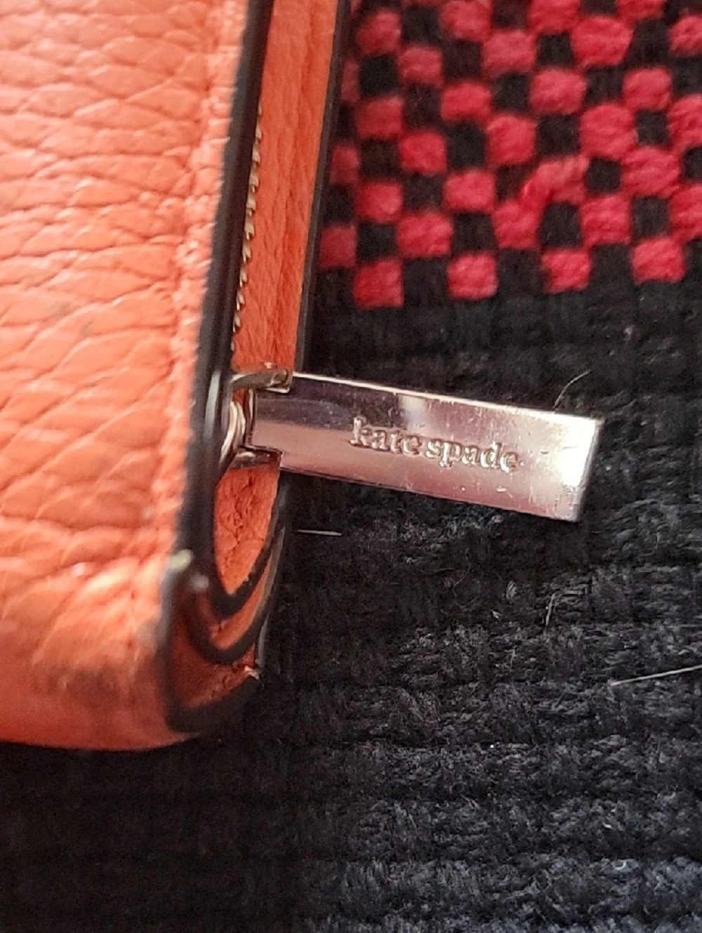 kate spade coral orange pebble leather zip-around wallet